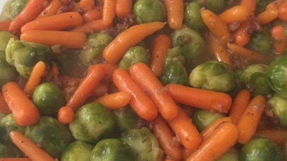 Baby Carrots And Brussels Sprouts Glazed With Brown Sugar and Pepper